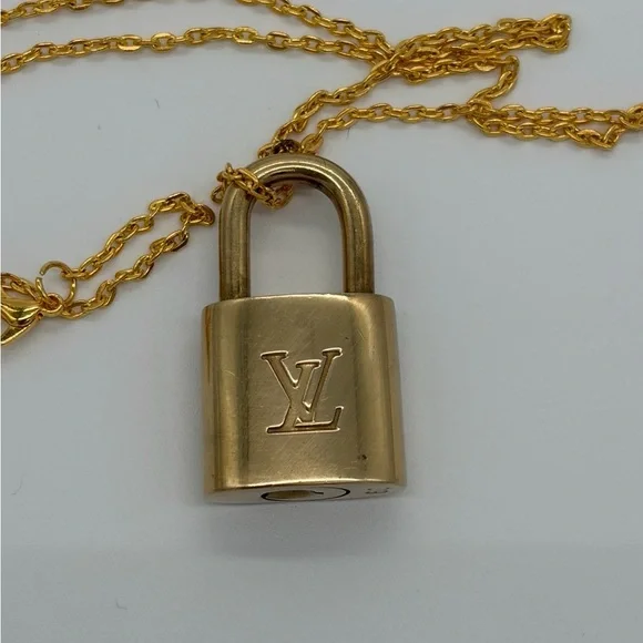 LOUIS VUITTON • Gold LV Lock w/ unbranded chain- Like New - Picture 2 of 4
